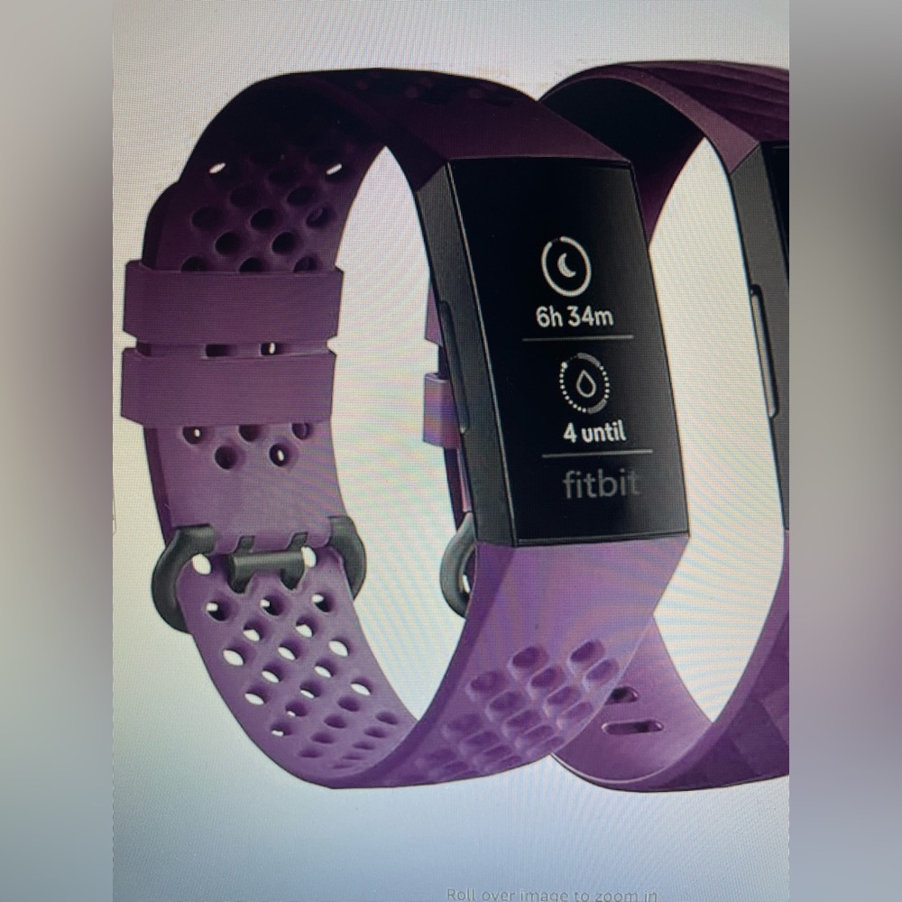 Charge 4 Fitbit Purple Smartwatch with Sleek Design and Digital Display